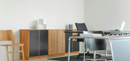 A clean and organized modern office space with stylish furniture and decor.